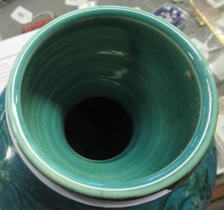 A RUSKIN VASE, early 20th century, of globular form with garlic type neck, the streaky blue souffle Image