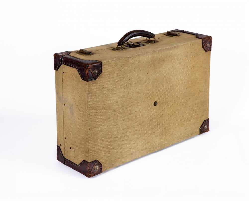 AN HERMES CANVAS AND LEATHER SUITCASE Image