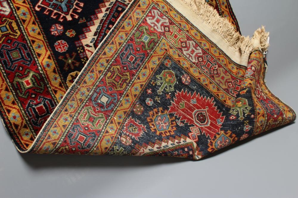 A PERSIAN TRIBAL RUG Image