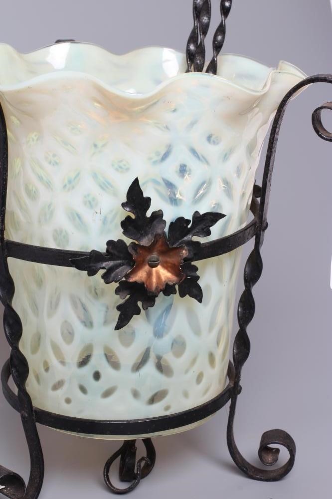 AN ART NOUVEAU WROUGHT IRON LANTERN Image