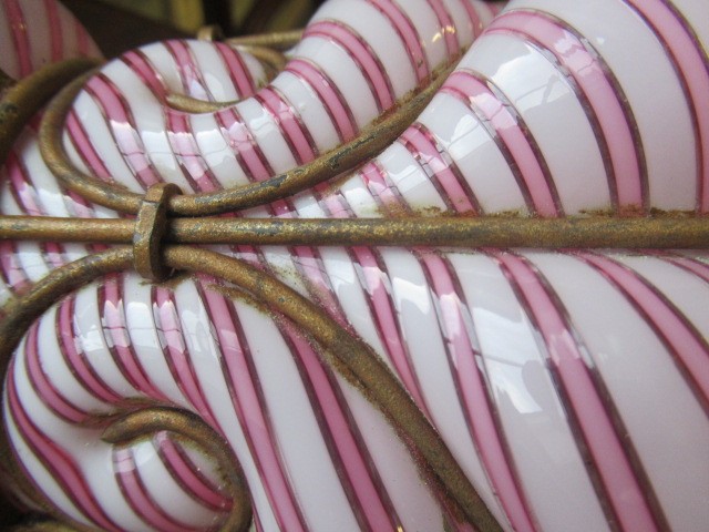 A VICTORIAN HANGING LANTERN, the wirework frame with a custom blown pink and white candy stripe Image