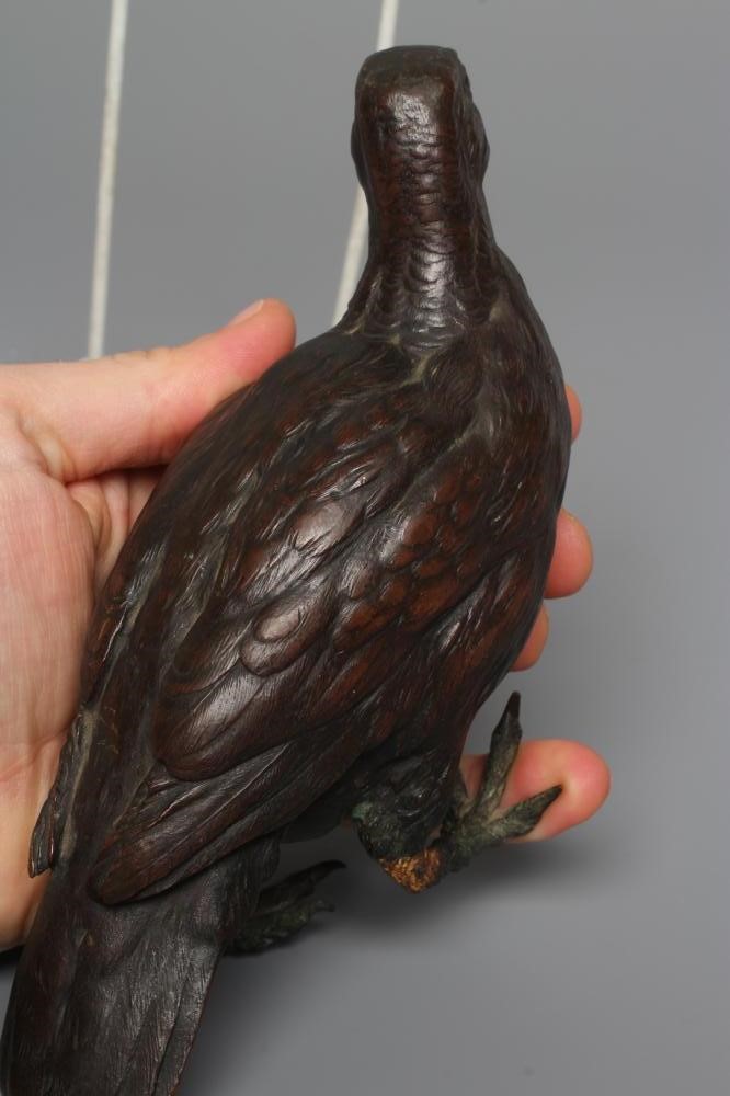 A FRANZ BERGMAN CAST BRONZE GROUSE, numbered 7508, factory mark and Geschutz, 7 1/2" long (Est. plus Image