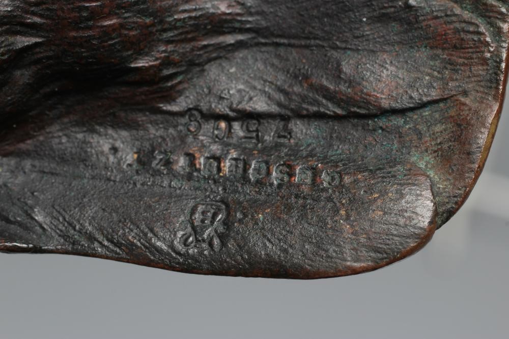 A FRANZ BERGMAN CAST BRONZE GROUSE, numbered 7508, factory mark and Geschutz, 7 1/2" long (Est. plus Image