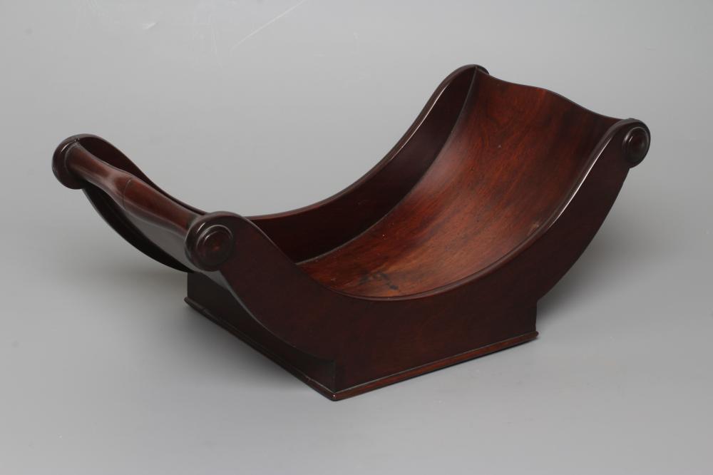 A REGENCY MAHOGANY CHEESE COASTER, early 19th century, with split baluster handles and applied Image