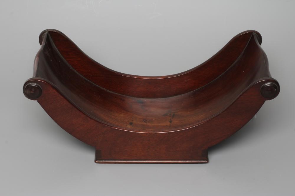 A REGENCY MAHOGANY CHEESE COASTER, early 19th century, with split baluster handles and applied Image