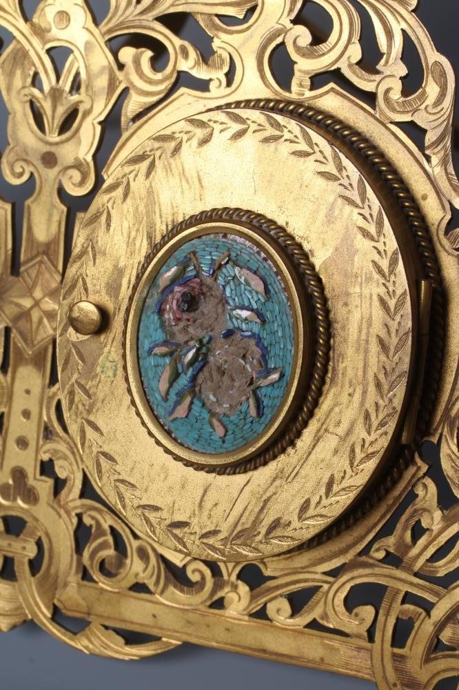 A LATE VICTORIAN GILT METAL TRIPLE PHOTOGRAPH FRAME of triangular section Image