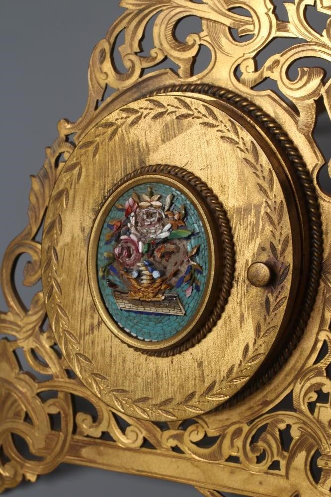 A LATE VICTORIAN GILT METAL TRIPLE PHOTOGRAPH FRAME of triangular section Image