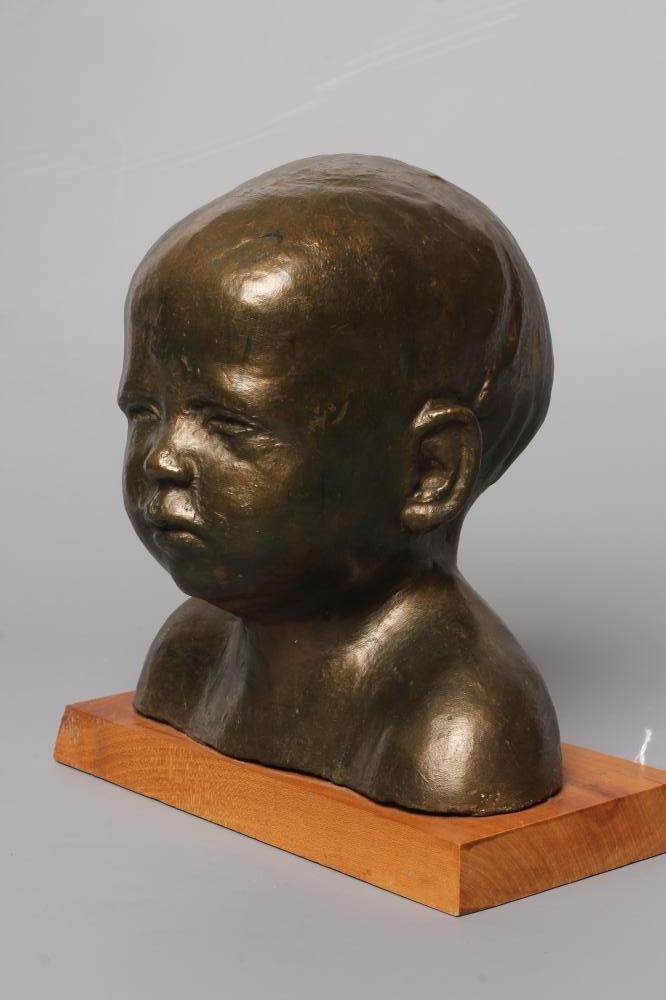 ROBERT K FRAMPTON (Contemporary) "One Year Old", bronzed composition bust on oblong wood base, Image