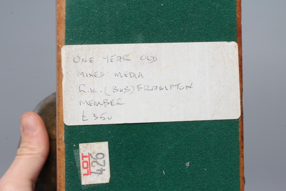 ROBERT K FRAMPTON (Contemporary) "One Year Old", bronzed composition bust on oblong wood base, Image