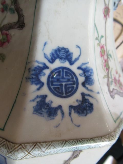 A CHINESE PORCELAIN VASE of swept octagonal form with two scrolling handles Image