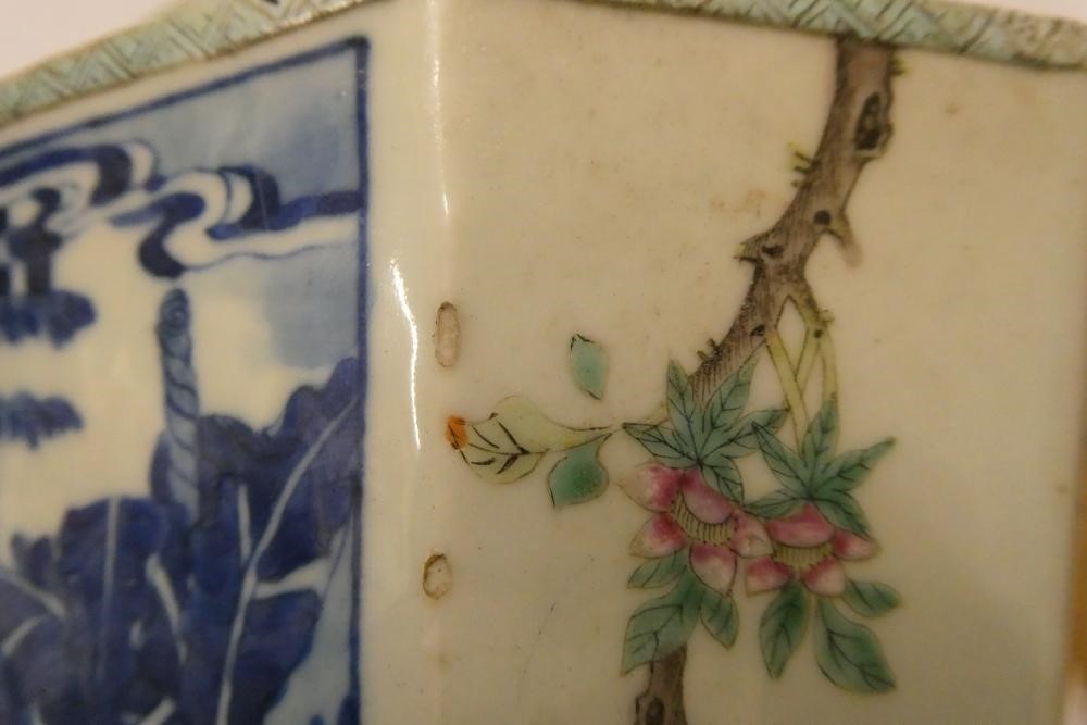 A CHINESE PORCELAIN VASE of swept octagonal form with two scrolling handles Image