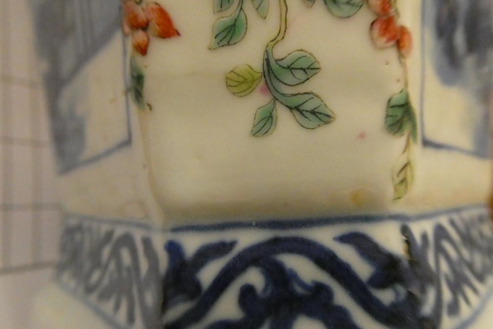 A CHINESE PORCELAIN VASE of swept octagonal form with two scrolling handles Image