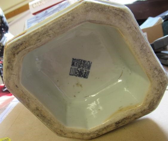 A CHINESE PORCELAIN VASE of swept octagonal form with two scrolling handles Image