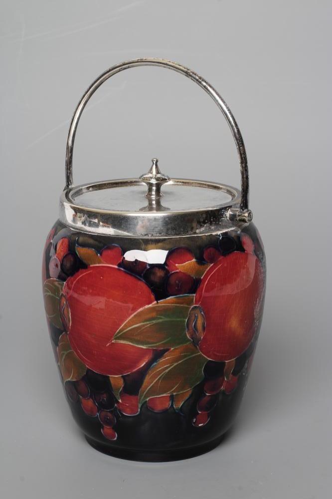 A MOORCROFT POTTERY POMEGRANATE BISCUIT BARREL Image