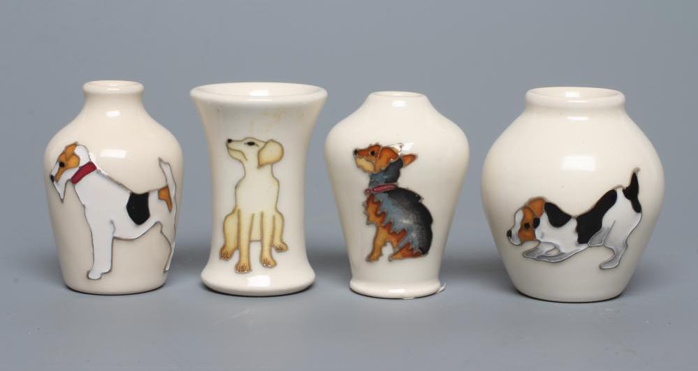 FOUR MINIATURE MOORCROFT POTTERY DOG VASES Image