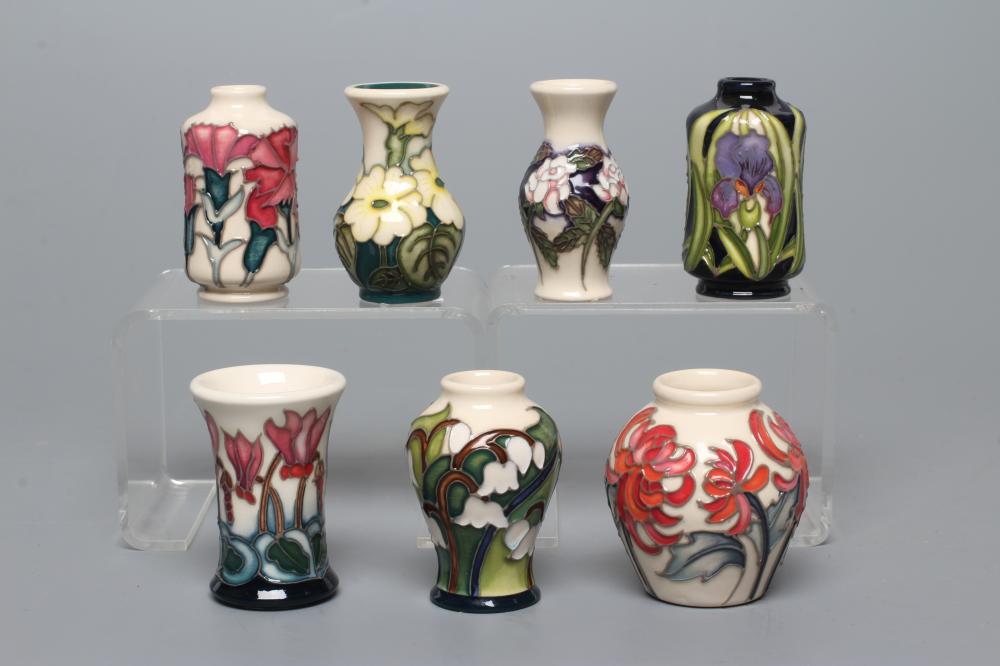 SEVEN MINIATURE MOORCROFT POTTERY VASES Image