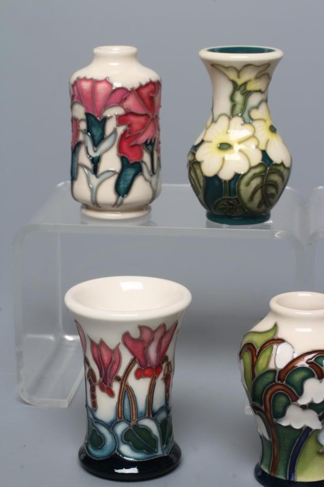 SEVEN MINIATURE MOORCROFT POTTERY VASES Image