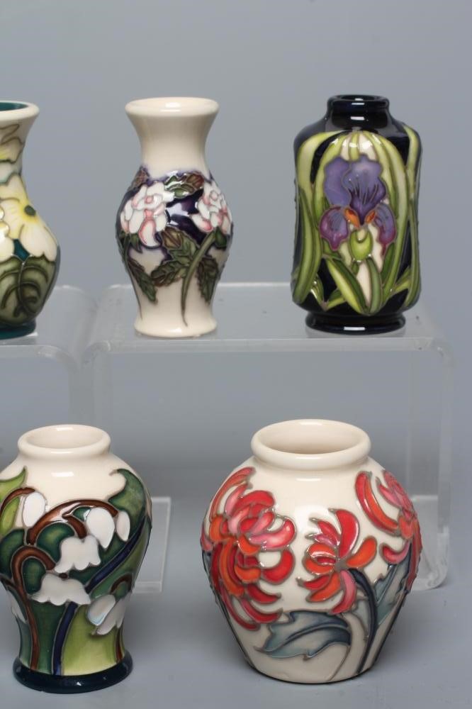 SEVEN MINIATURE MOORCROFT POTTERY VASES Image