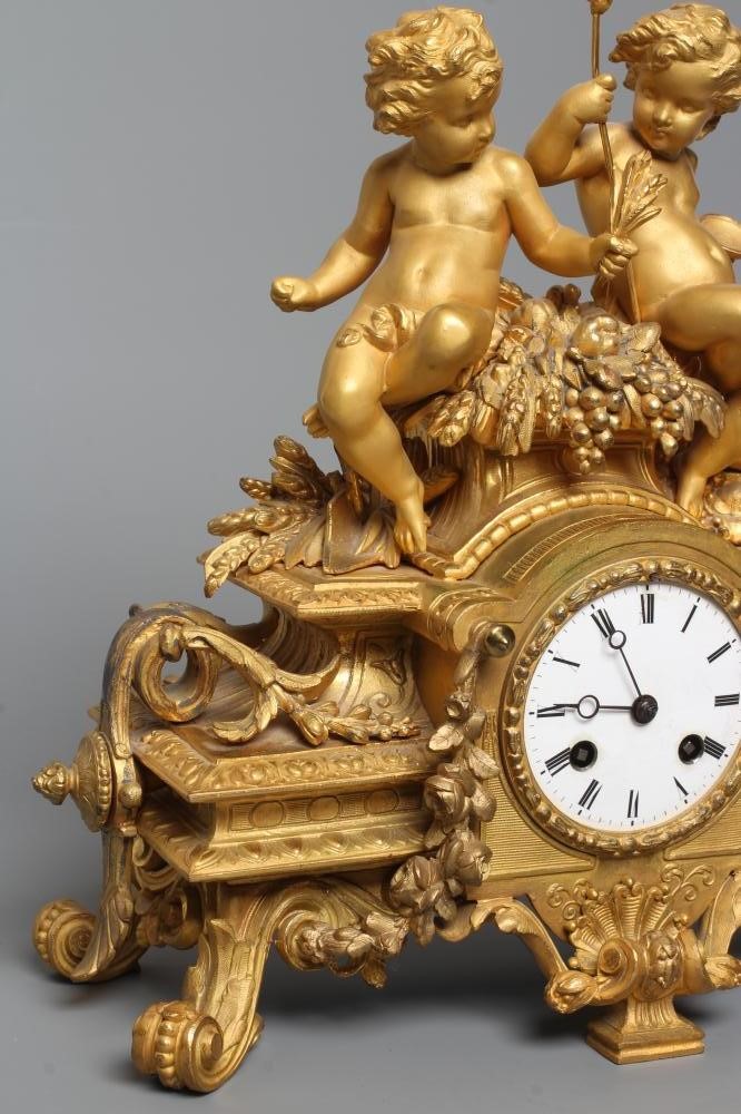 A FRENCH ORMOLU MANTEL CLOCK Image