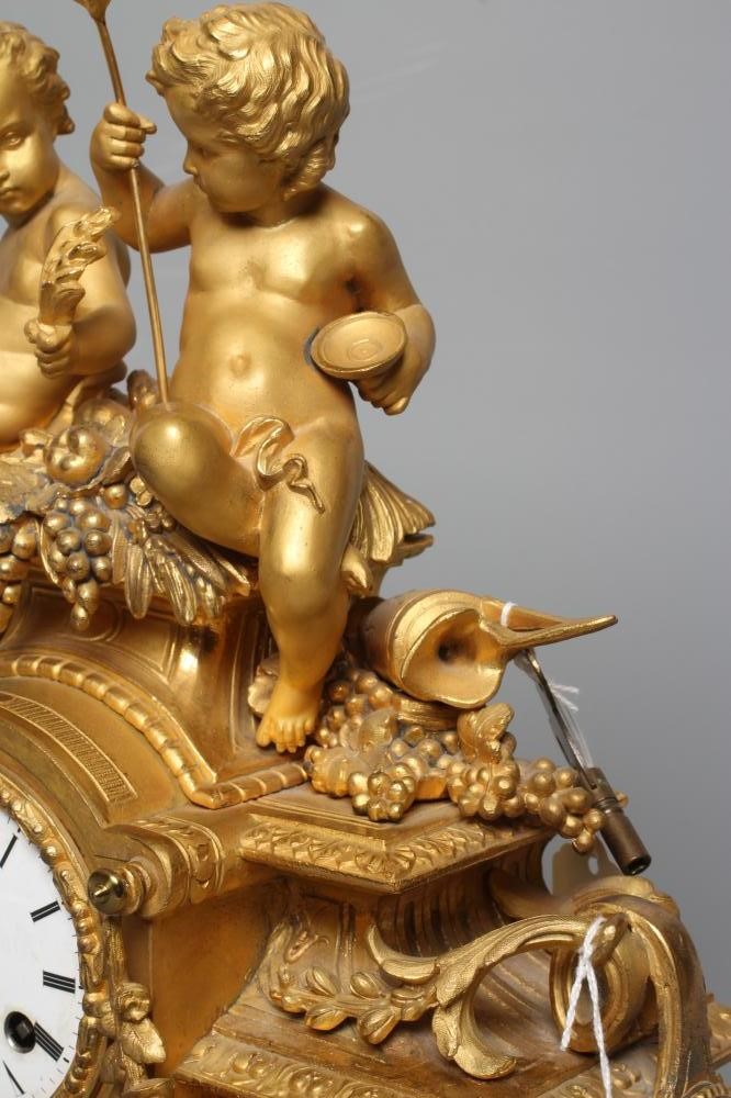 A FRENCH ORMOLU MANTEL CLOCK Image