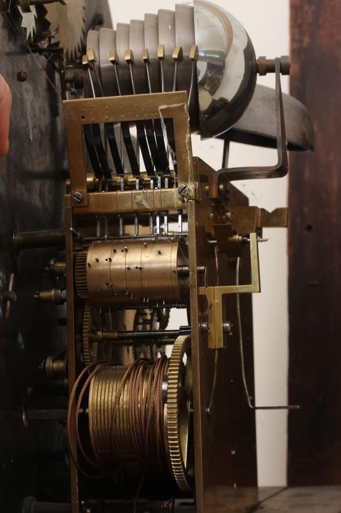 A MAHOGANY CHIMING LONGCASE Image