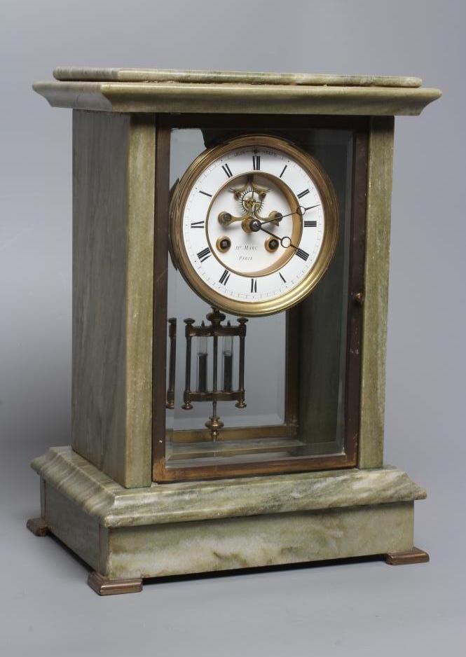 A FRENCH MARBLE MANTEL CLOCK Image