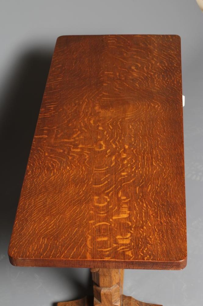 A ROBERT THOMPSON ADZED OAK COFFEE TABLE Image