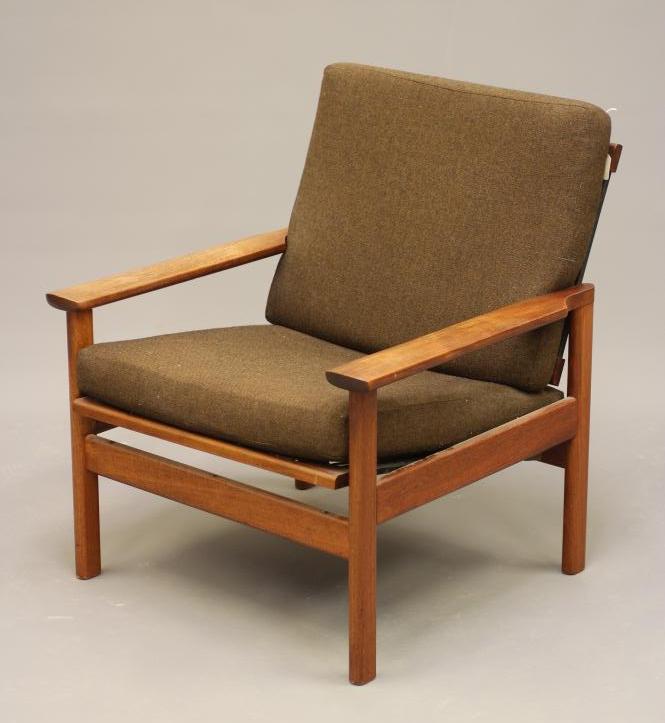A RETRO TEAK FRAMED LOUNGE CHAIR with loose cushions in brown tweed Image