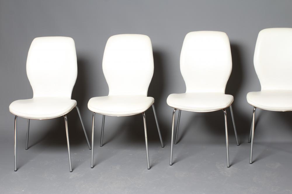 A SET OF SIX MOULDED TEAK VENEERED DINING CHAIRS Image