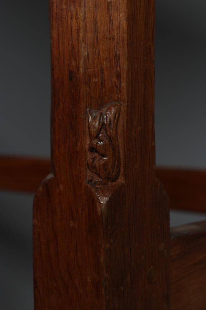 A WILFRED HUTCHINSON (HUSTWAITE) NEST OF THREE ADZED OAK TABLES Image