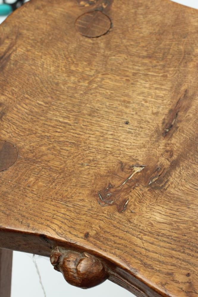 A ROBERT THOMPSON OAK STOOL Image