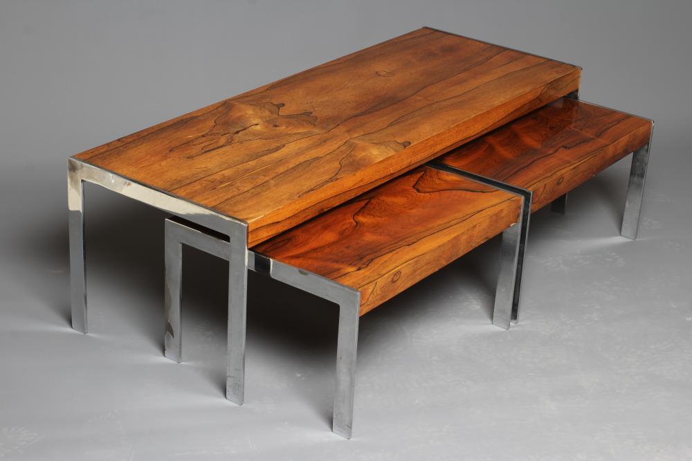 A NEST OF ROSEWOOD COFFEE TABLES Image