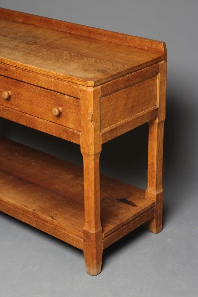 A PETER HEAP ADZED OAK SIDE TABLE Image