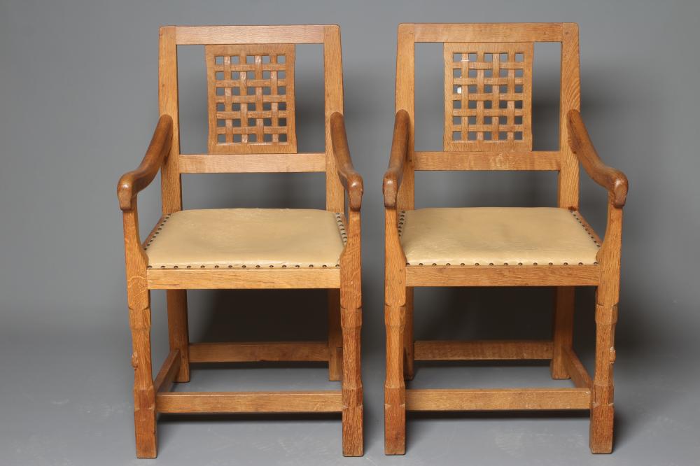 A PAIR OF PETER HEAP OAK ELBOW CHAIRS Image