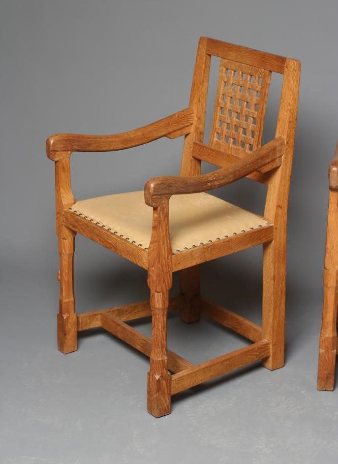 A PAIR OF PETER HEAP OAK ELBOW CHAIRS Image