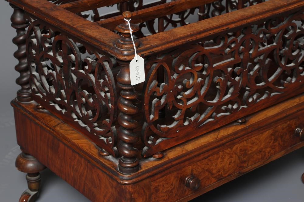 A VICTORIAN BURR WALNUT CANTERBURY of oblong form with fret work sides and two divisions on spindle Image