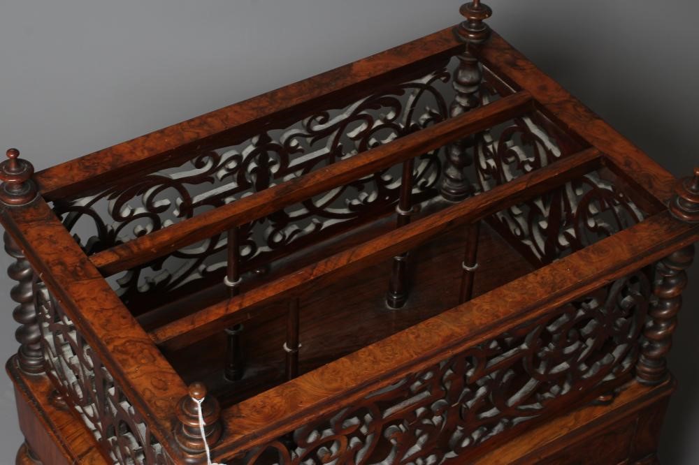 A VICTORIAN BURR WALNUT CANTERBURY of oblong form with fret work sides and two divisions on spindle Image
