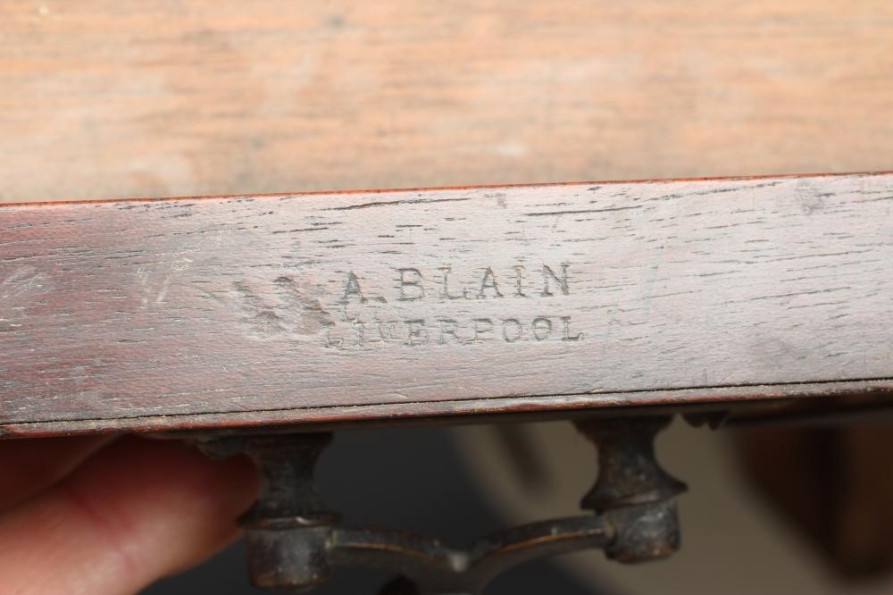 A MAHOGANY CANTERBURY Image