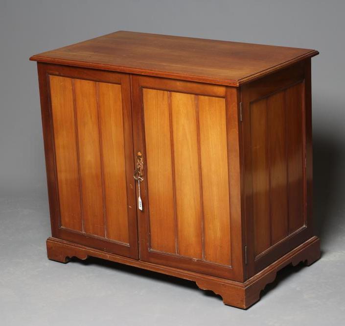 A VICTORIAN MAHOGANY DOCUMENT CABINET of panelled oblong form in the Aesthetic taste Image