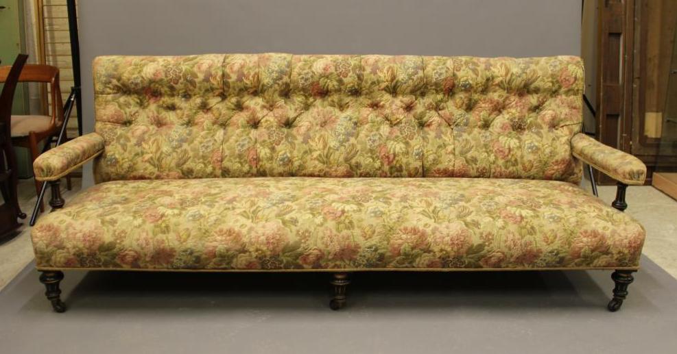 AN AESTHETIC EBONISED AND PARCEL GILT CLUB SETTEE Image