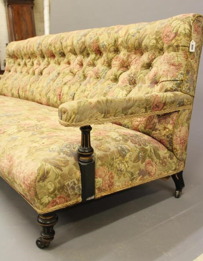 AN AESTHETIC EBONISED AND PARCEL GILT CLUB SETTEE Image
