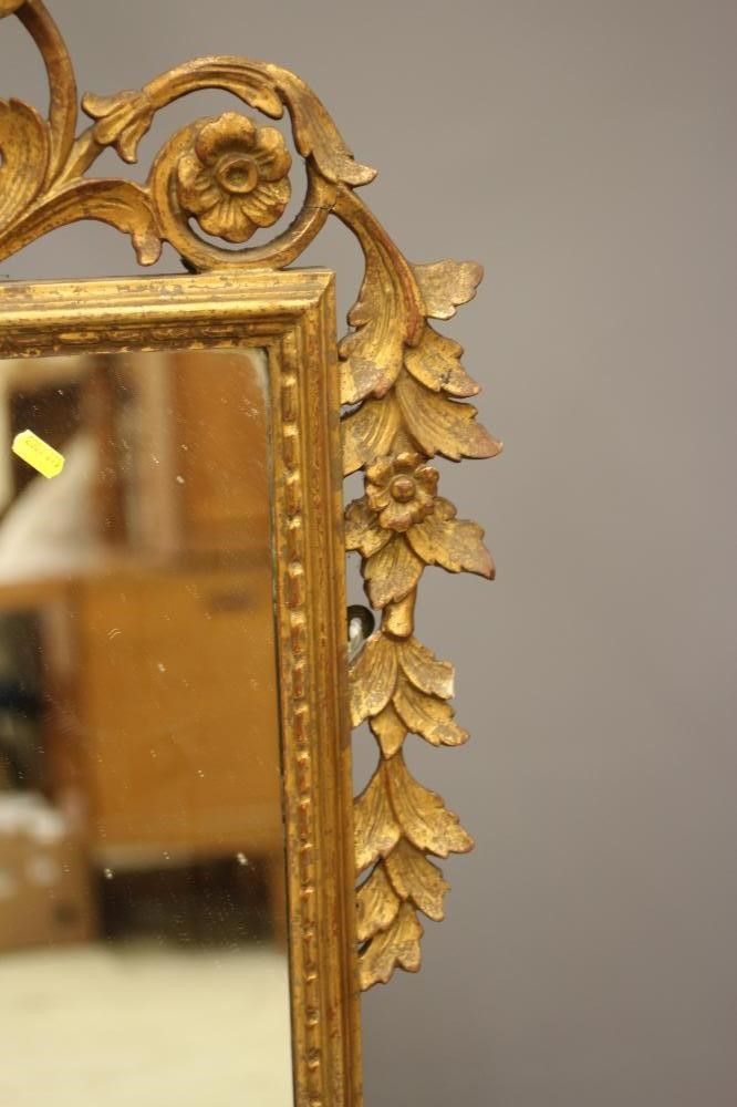 A GEORGIAN STYLE CARVED GILTWOOD PIER GLASS Image