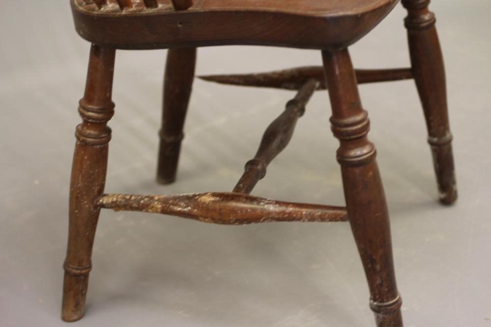 AN ASH AND ELM STICK BACK WINDSOR ARMCHAIR Image