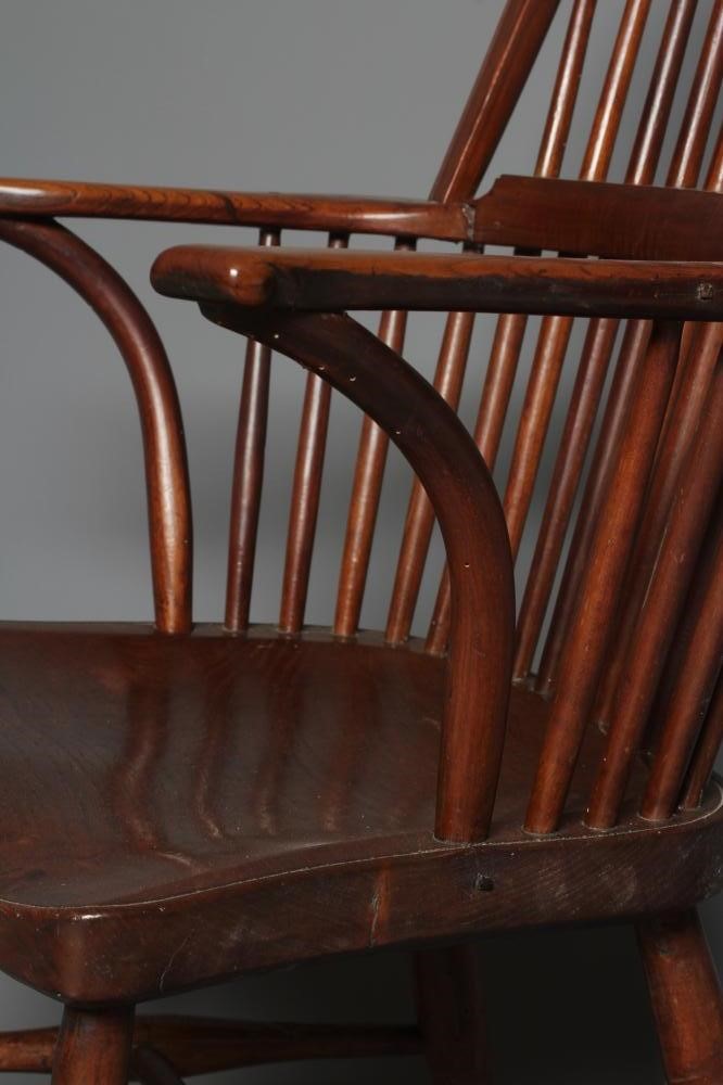 AN ASH AND ELM STICK BACK WINDSOR ARMCHAIR Image
