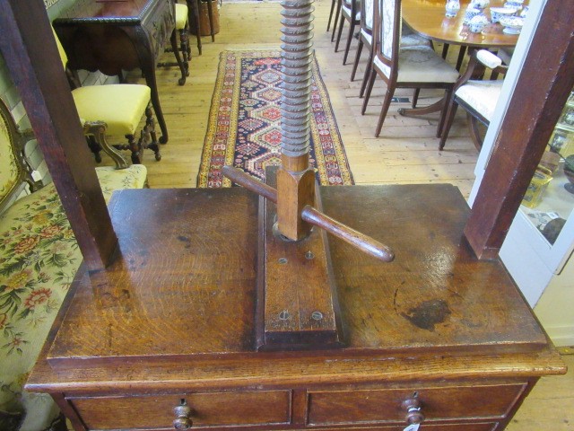 AN OAK CLOTHES PRESS Image