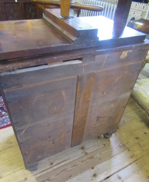 AN OAK CLOTHES PRESS Image