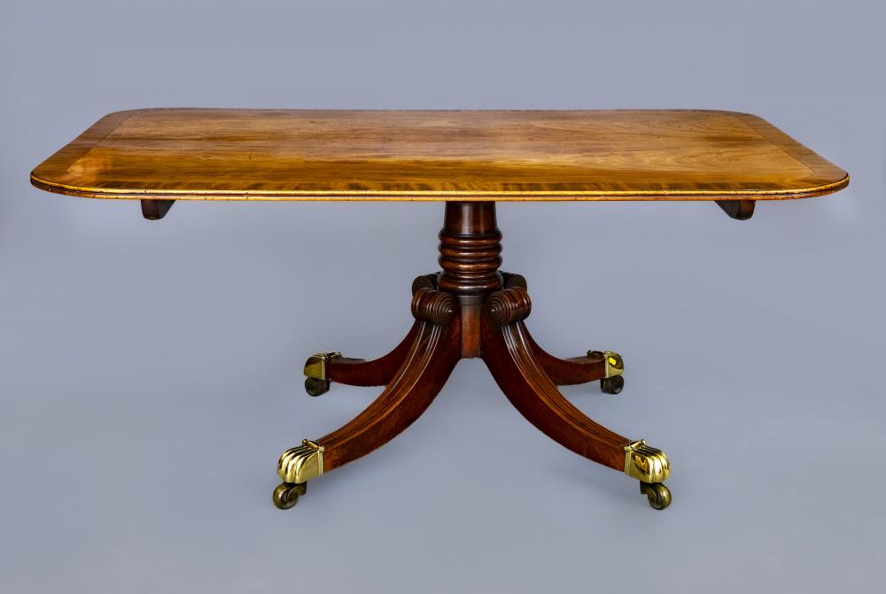 A REGENCY MAHOGANY BREAKFAST TABLE Image