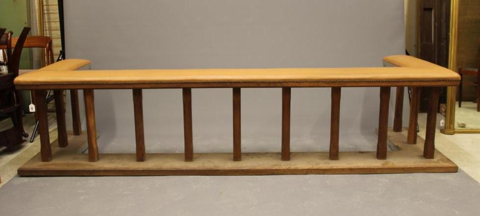 A LARGE OAK CLUB FENDER, 20th century, the padded tan leather seat on square section supports, on Image