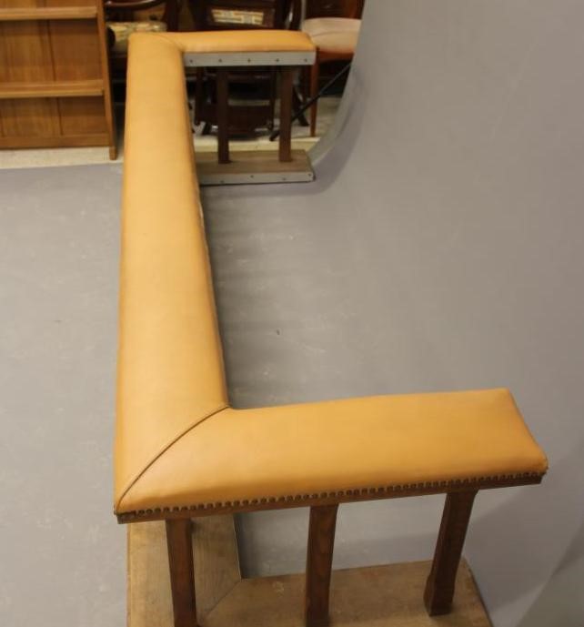 A LARGE OAK CLUB FENDER, 20th century, the padded tan leather seat on square section supports, on Image