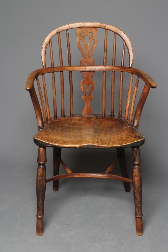 A YEW AND ELM WINDSOR ARMCHAIR Image